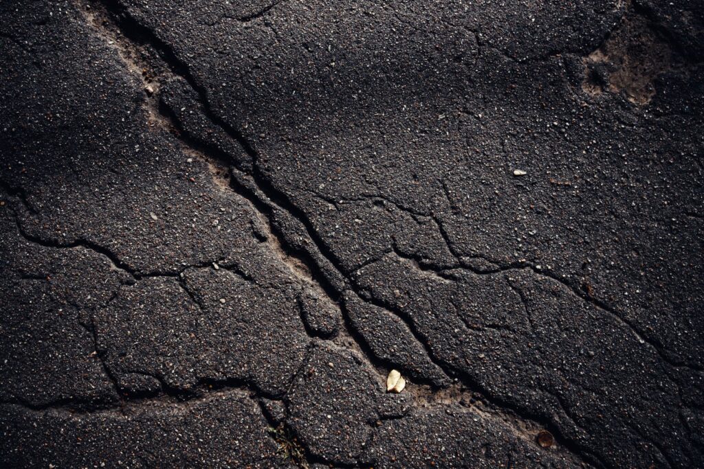 Closeup shot of a textured asphalt background