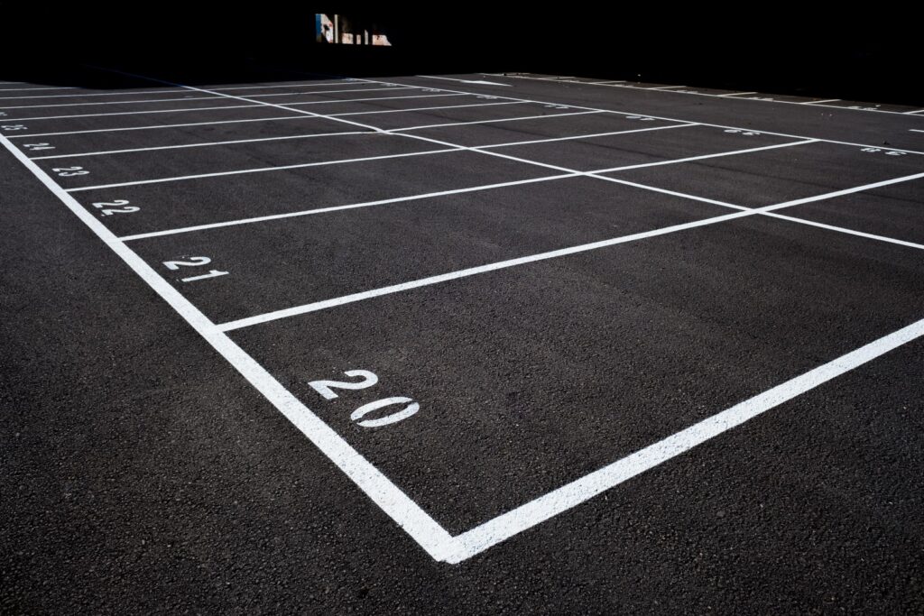 Commercial blacktop parking lot in Staten Island with fresh striping by Morreale Asphalt Paving